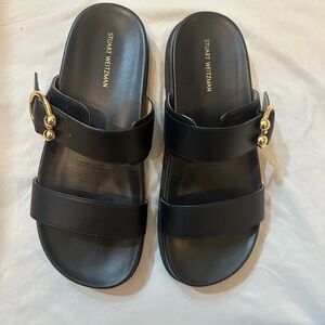 Stuart Weitzman Black Sandals with Gold Accents